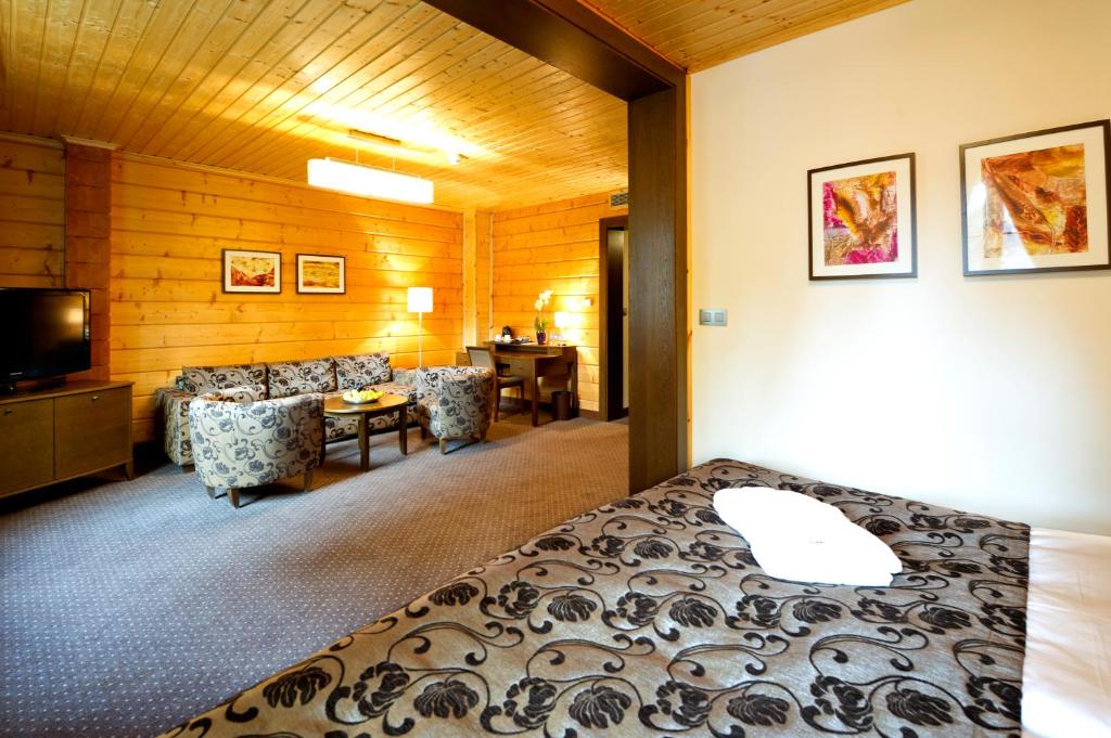 Postel nebo postele na pokoji v ubytování Hotel Zochova Chata - Adult friendly
