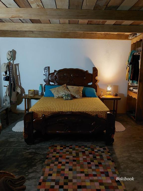Postel nebo postele na pokoji v ubytování Tiny House Chamego