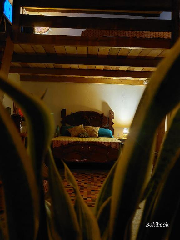 Postel nebo postele na pokoji v ubytování Tiny House Chamego