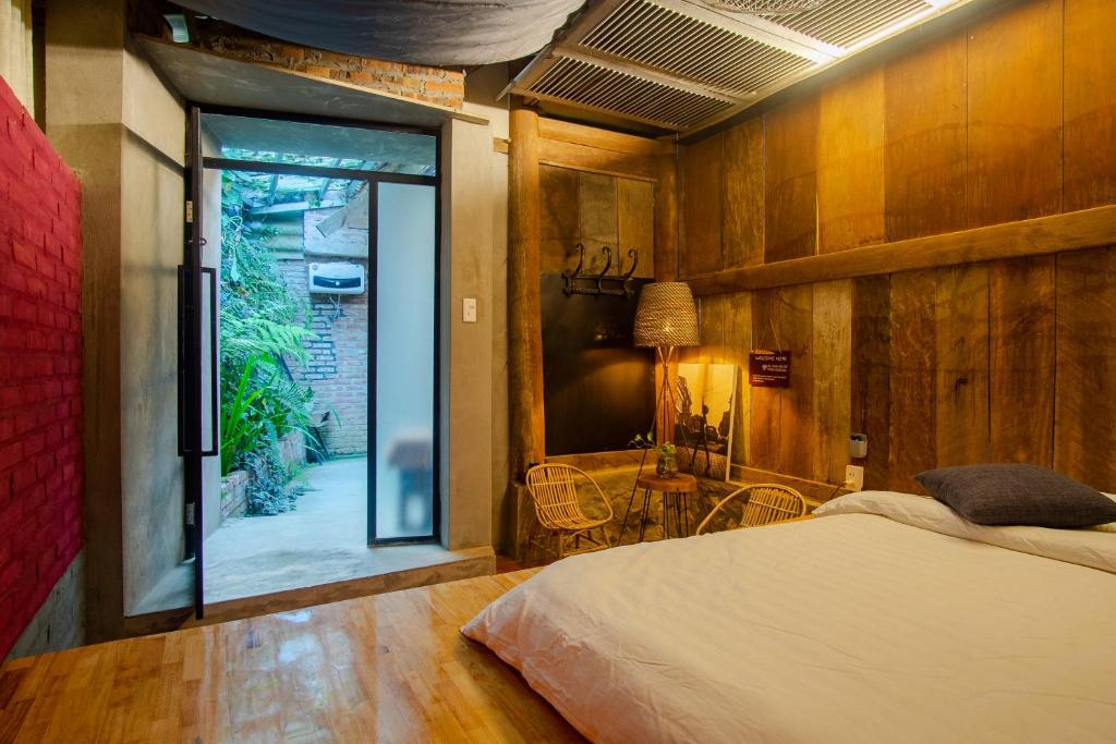 Giường trong phòng chung tại De Yang House Sa Pa
