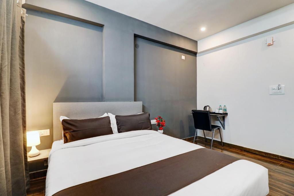 Postel nebo postele na pokoji v ubytování Super Townhouse XOTEL
