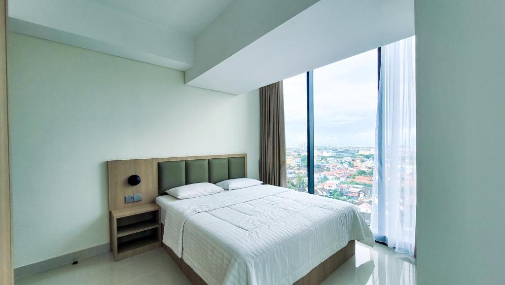 Palam Mansion at Meisterstadt Pollux Habibie Apartment - Two-Bedroom Apartment With Bay View