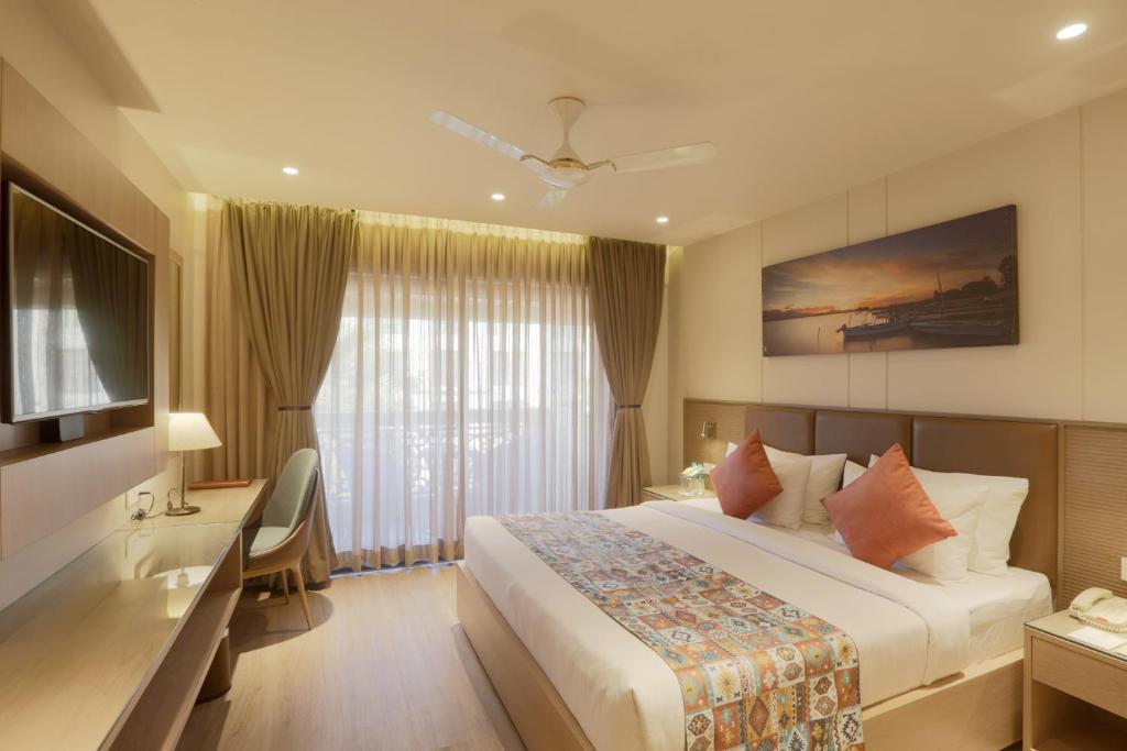 Postel nebo postele na pokoji v ubytování Resort De Coracao - Calangute , Goa