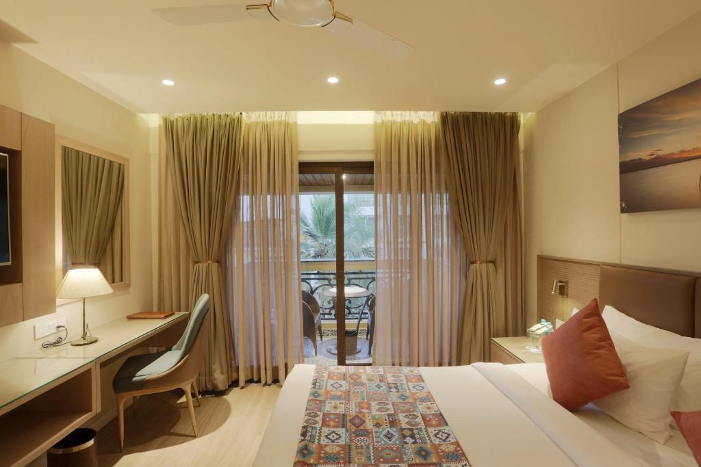 Postel nebo postele na pokoji v ubytování Resort De Coracao - Calangute , Goa