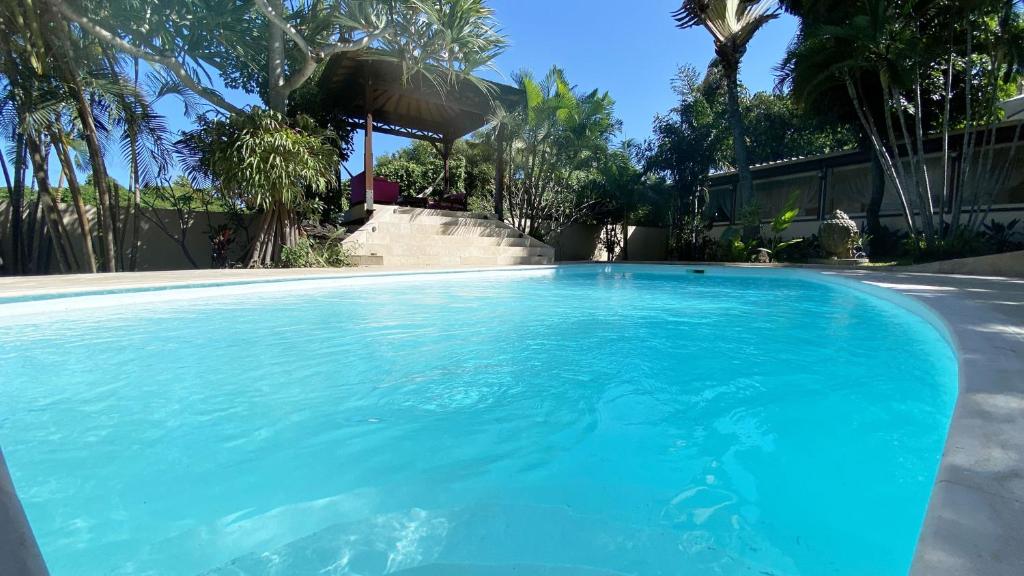 Bazén v ubytování COLIVER - COLIVING A LA RÉUNION nebo v jeho okolí