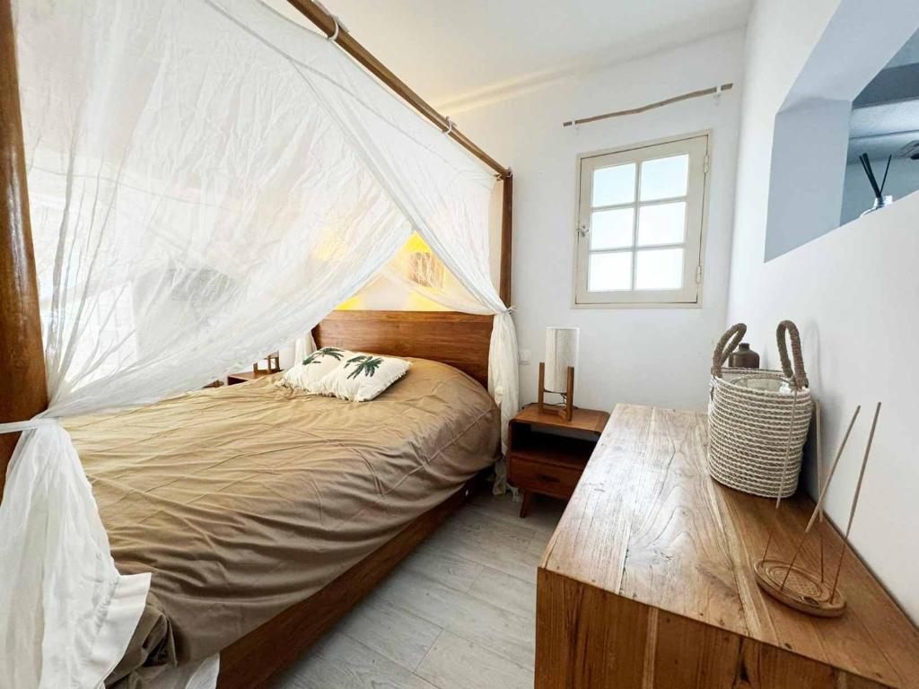 Postel nebo postele na pokoji v ubytování COLIVER - COLIVING A LA RÉUNION