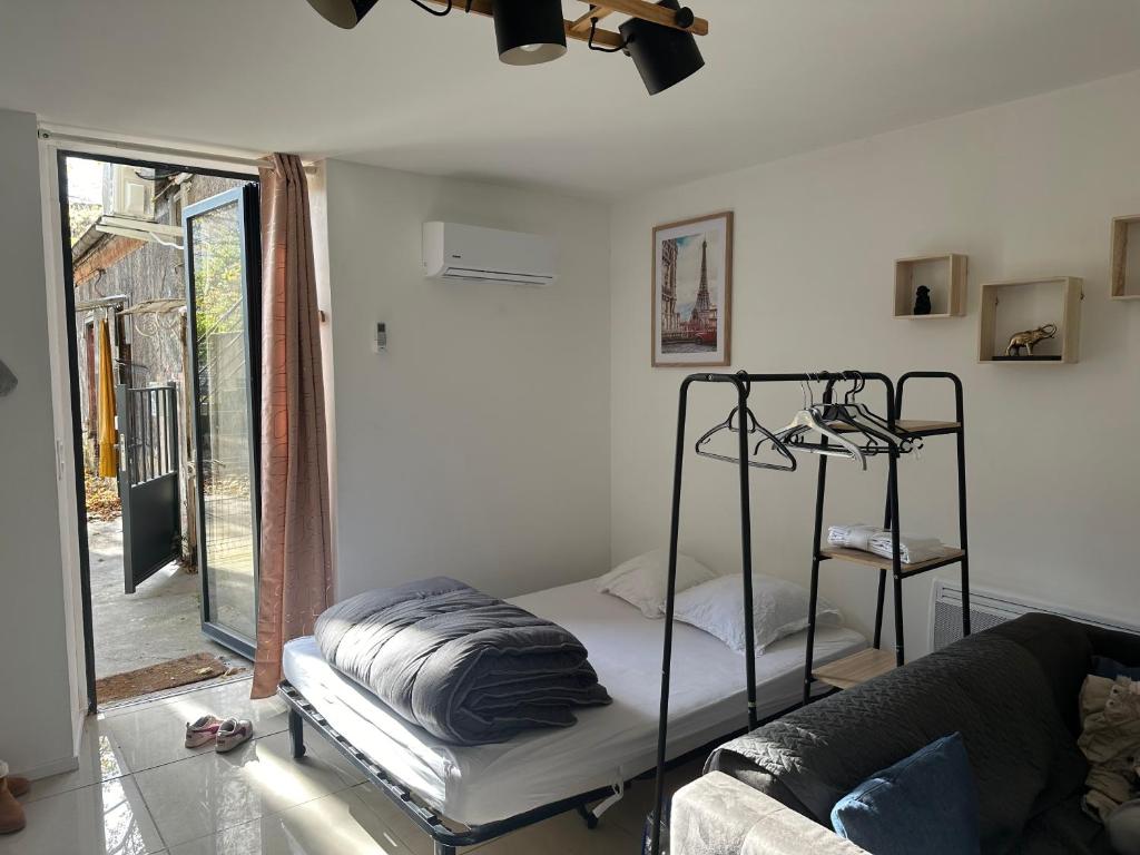 Postel nebo postele na pokoji v ubytování Appartement Centre ville