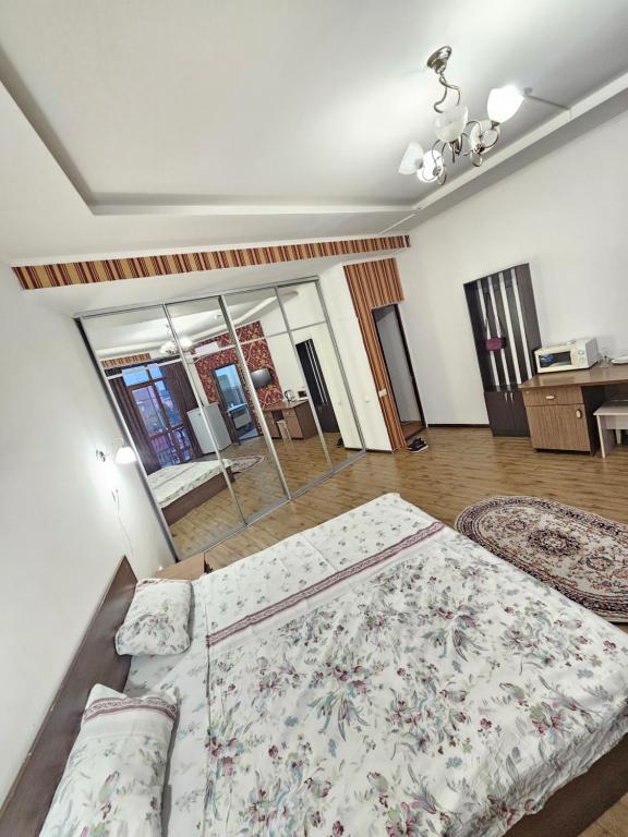 Ένα ή περισσότερα κρεβάτια σε δωμάτιο στο Taugul apartment