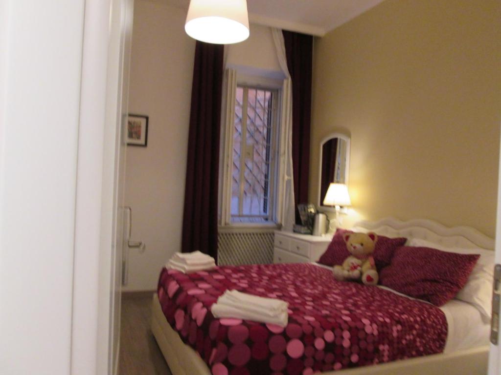 Cama o camas de una habitación en Trevi Elegance Suite