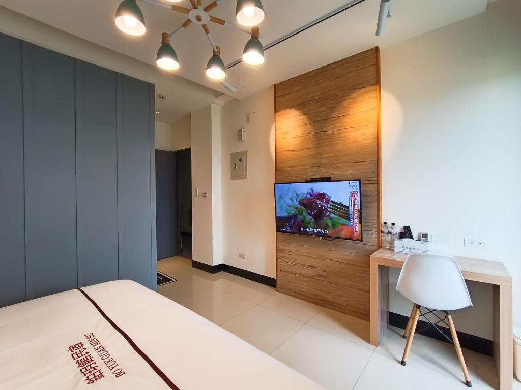 TV a/nebo společenská místnost v ubytování 鉑玥館民宿