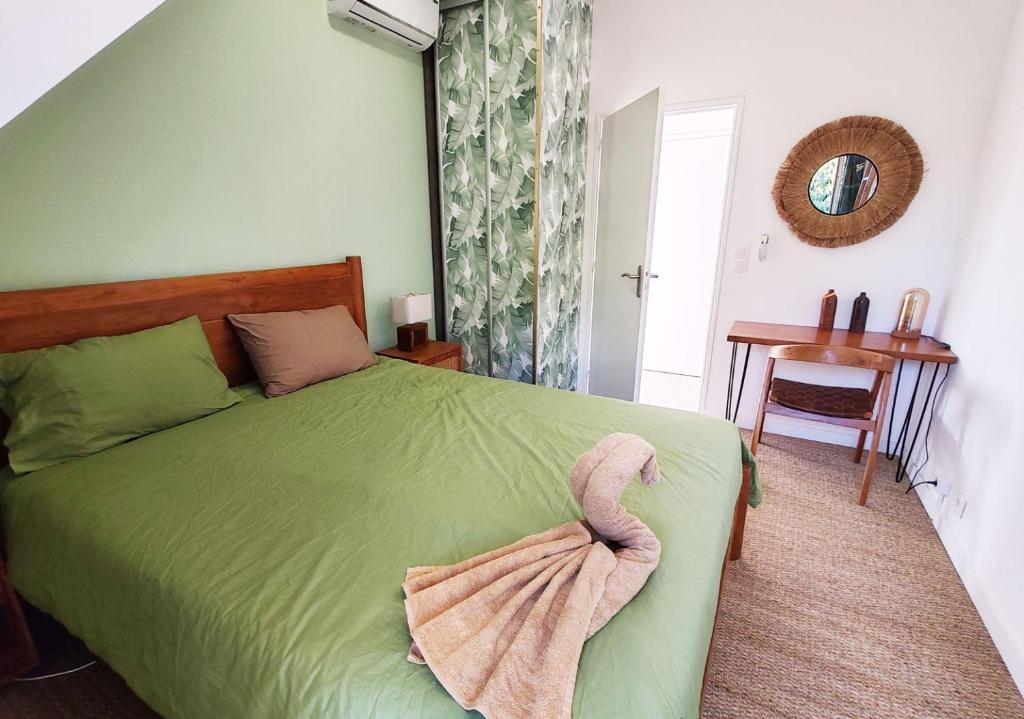 Postel nebo postele na pokoji v ubytování COLIVER - COLIVING A LA RÉUNION