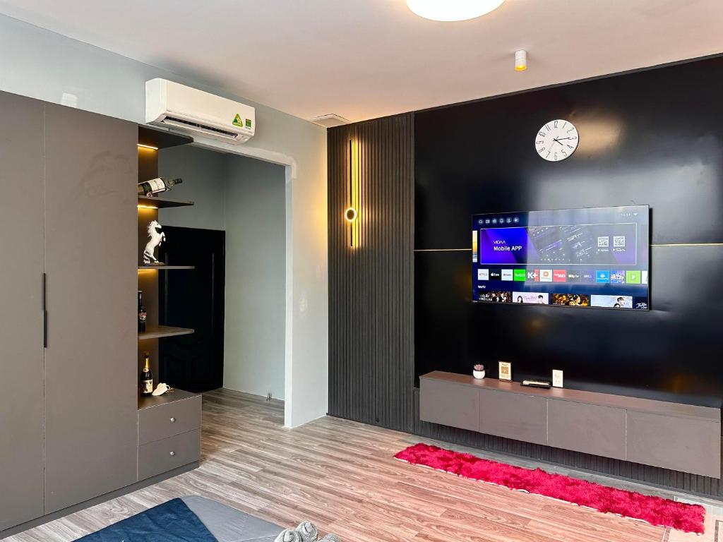 TV a/nebo společenská místnost v ubytování Spring Home