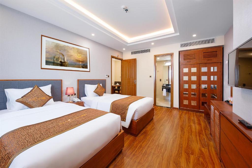 Postel nebo postele na pokoji v ubytování Mercury Apartment Danang