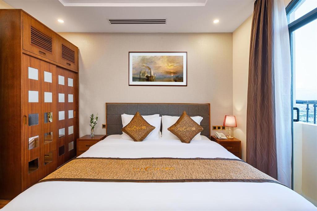 Postel nebo postele na pokoji v ubytování Mercury Apartment Danang