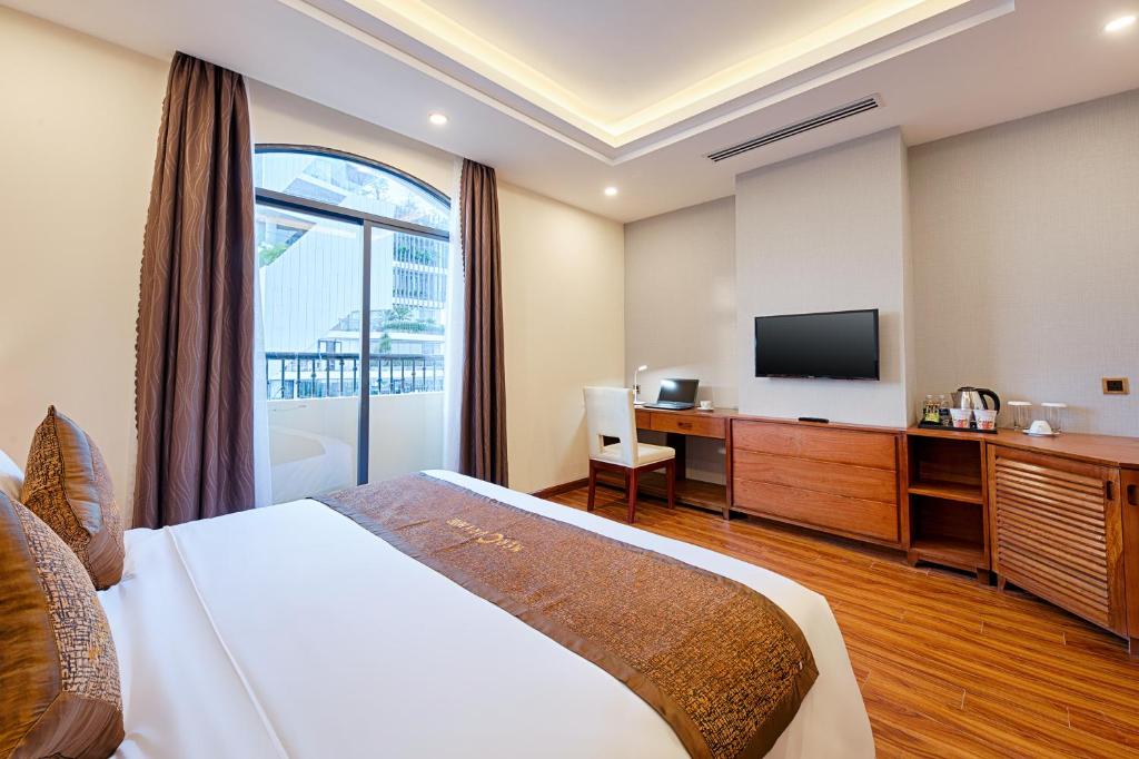Postel nebo postele na pokoji v ubytování Mercury Apartment Danang
