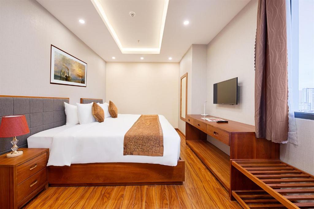 Postel nebo postele na pokoji v ubytování Mercury Apartment Danang