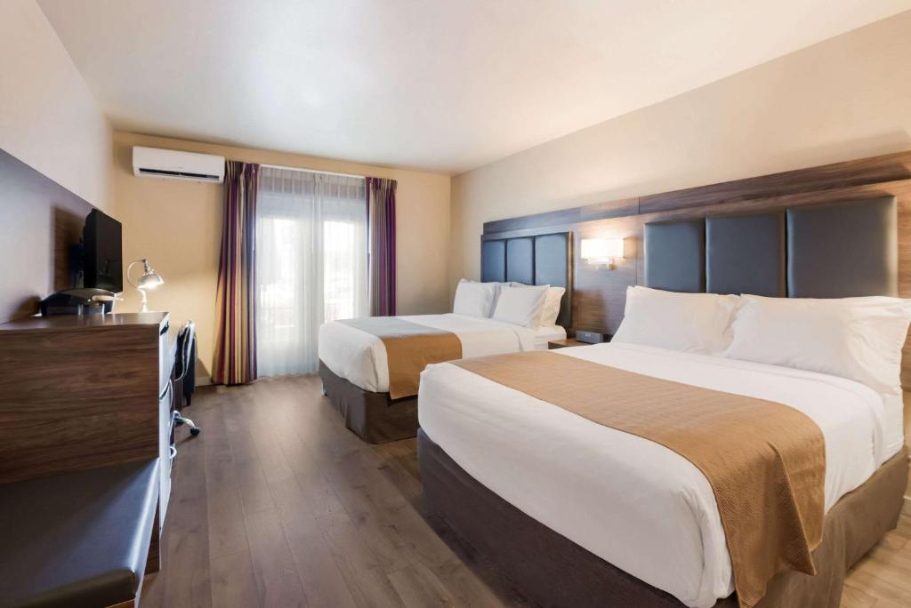 Postel nebo postele na pokoji v ubytování Inn at Port Gardner-Everett Waterfront, Ascend Hotel Collection