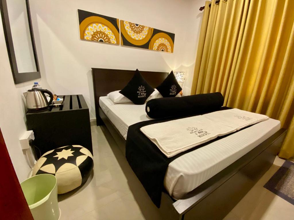 Postel nebo postele na pokoji v ubytování Abhaya Resorts
