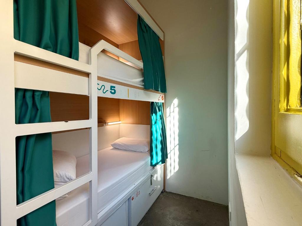 Cama ou camas em um quarto em The Loft House Barcelona