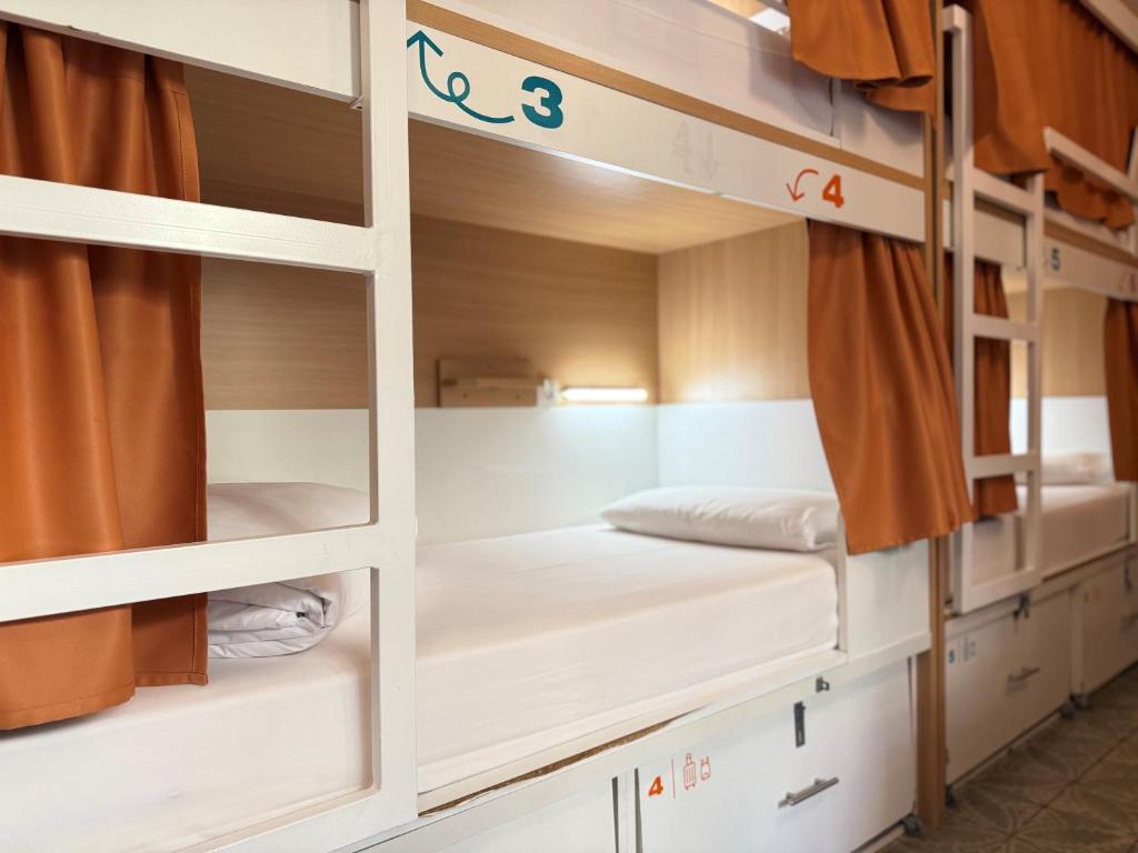 Cama ou camas em um quarto em The Loft House Barcelona