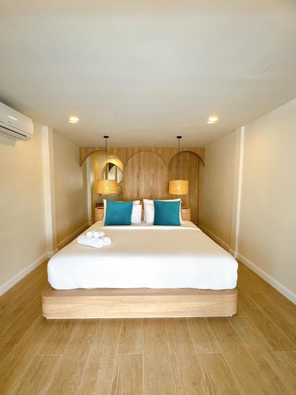 Postel nebo postele na pokoji v ubytování Kerala Coco Resort