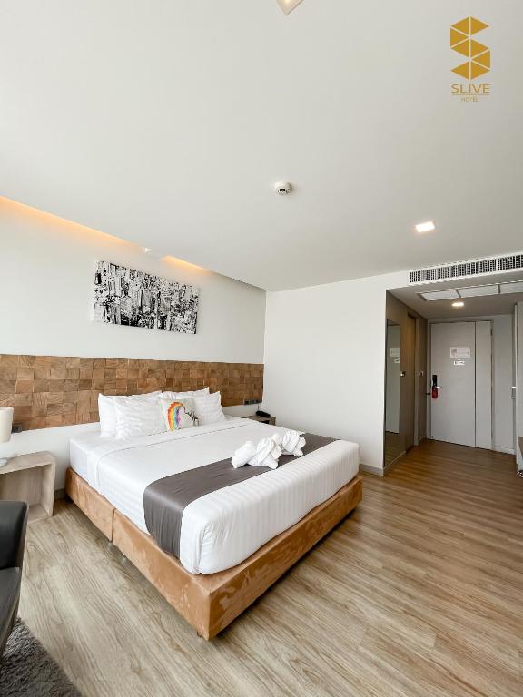 Postel nebo postele na pokoji v ubytování Slive Hotel