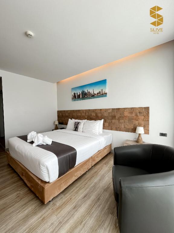 Postel nebo postele na pokoji v ubytování Slive Hotel