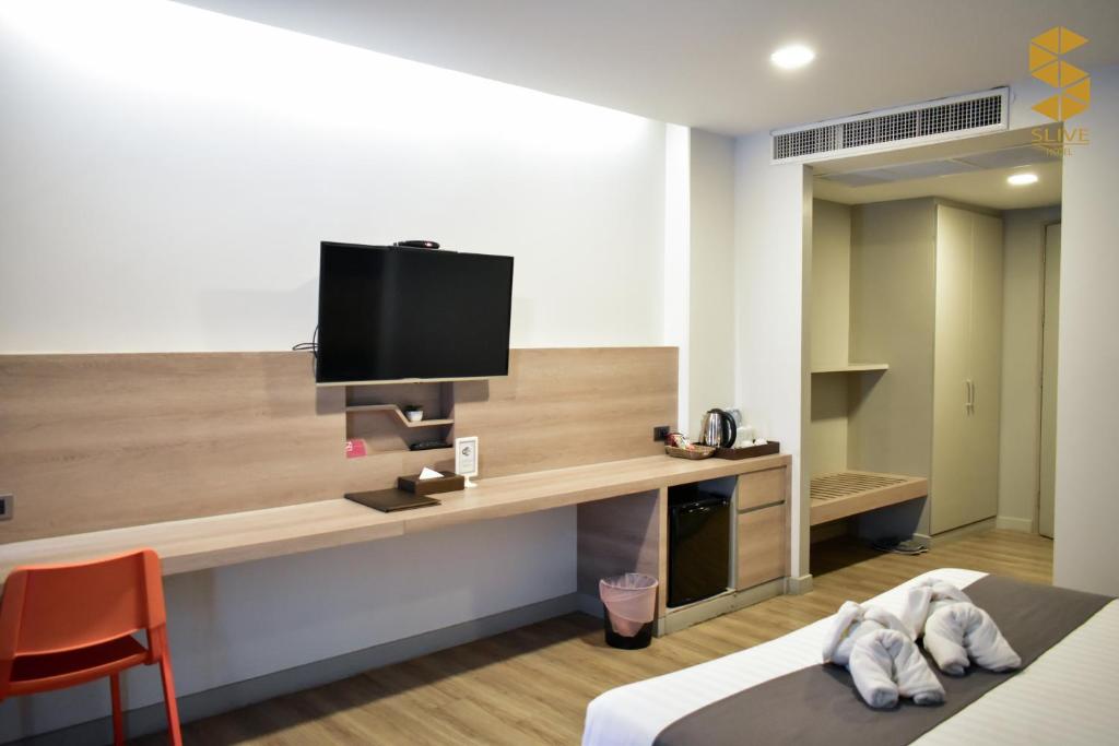 TV a/nebo společenská místnost v ubytování Slive Hotel