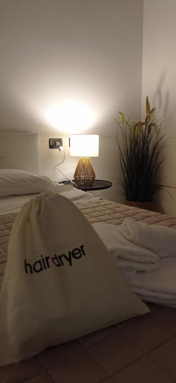 Postel nebo postele na pokoji v ubytování Hotel IL Rifugio