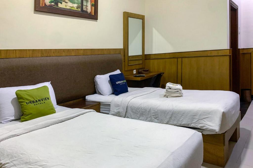 Urbanview Alfiya Hotel Lampung by RedDoorz - Quarto Twin Superior