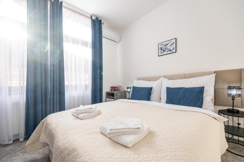 Postel nebo postele na pokoji v ubytování Hotel Litovel