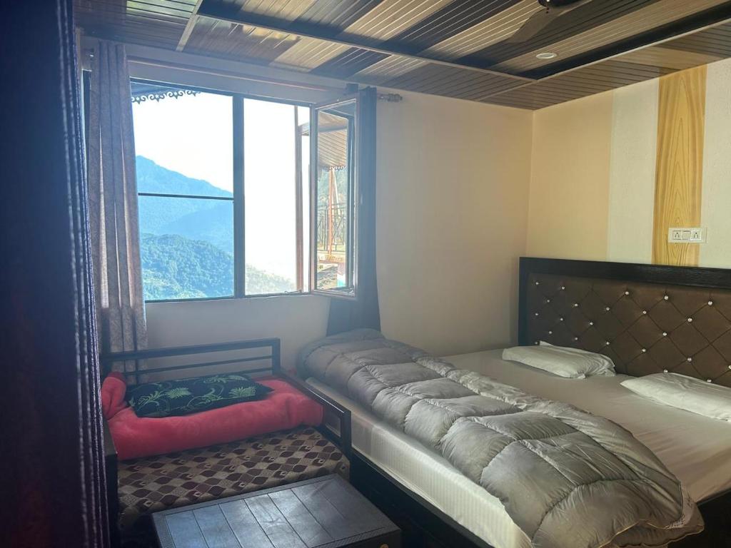 Postel nebo postele na pokoji v ubytování Hotel Mountain View