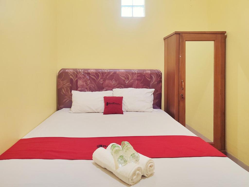 OYO 92792 Umi Rahayu Guesthouse - Housity