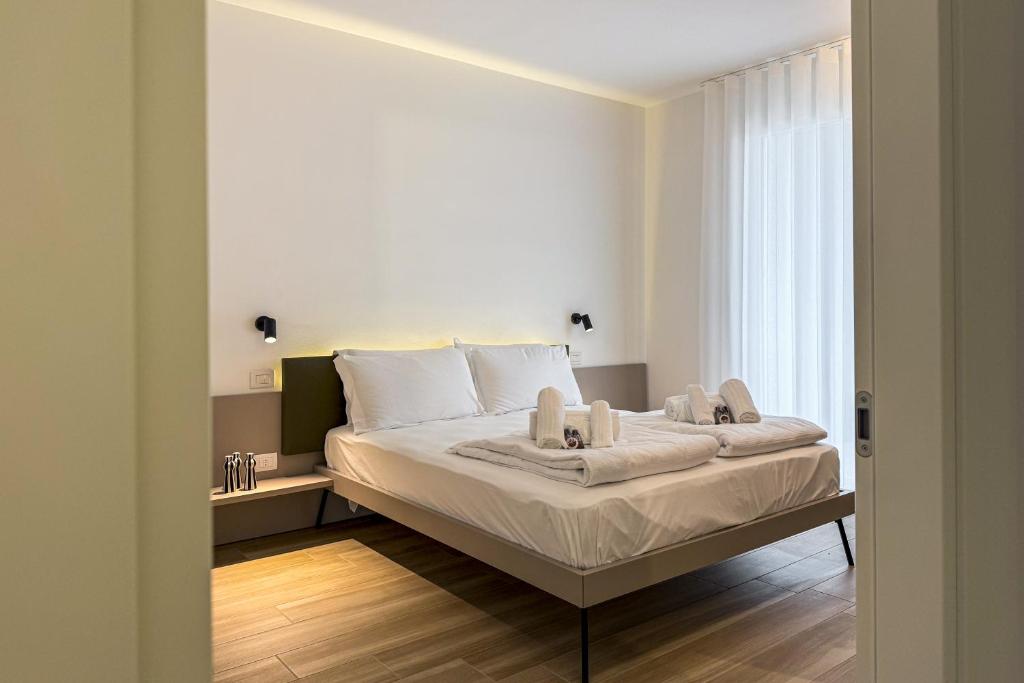 Postel nebo postele na pokoji v ubytování Residence Canova