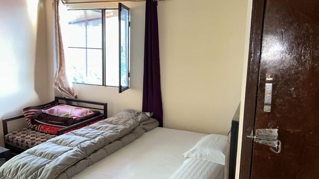 Postel nebo postele na pokoji v ubytování Hotel Mountain View