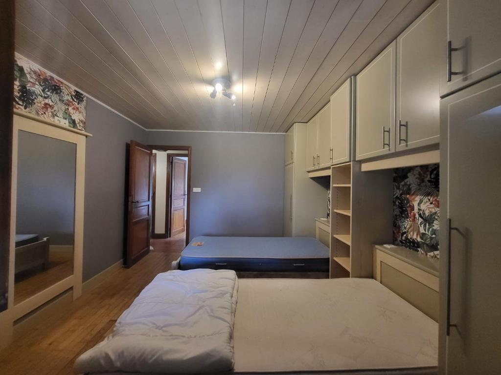 Postel nebo postele na pokoji v ubytování Chez Mike