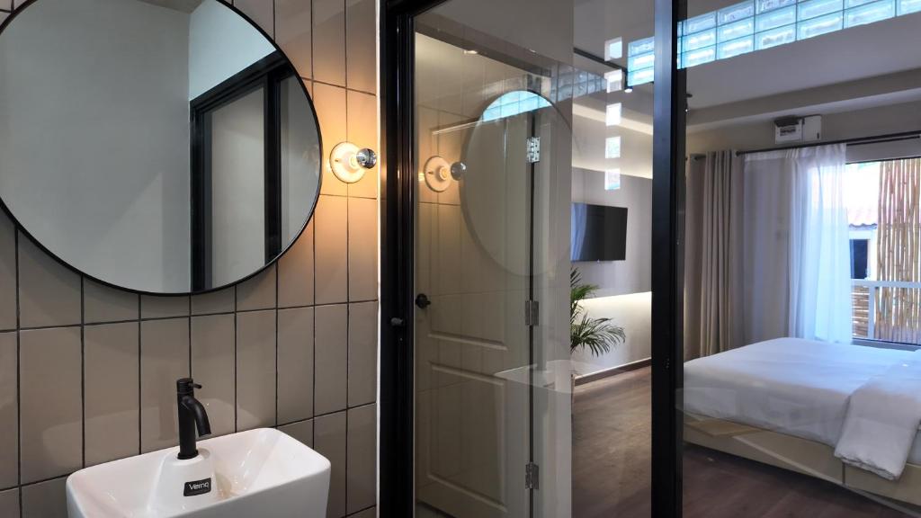 Postel nebo postele na pokoji v ubytování Suncloud Hotel Koh Samet