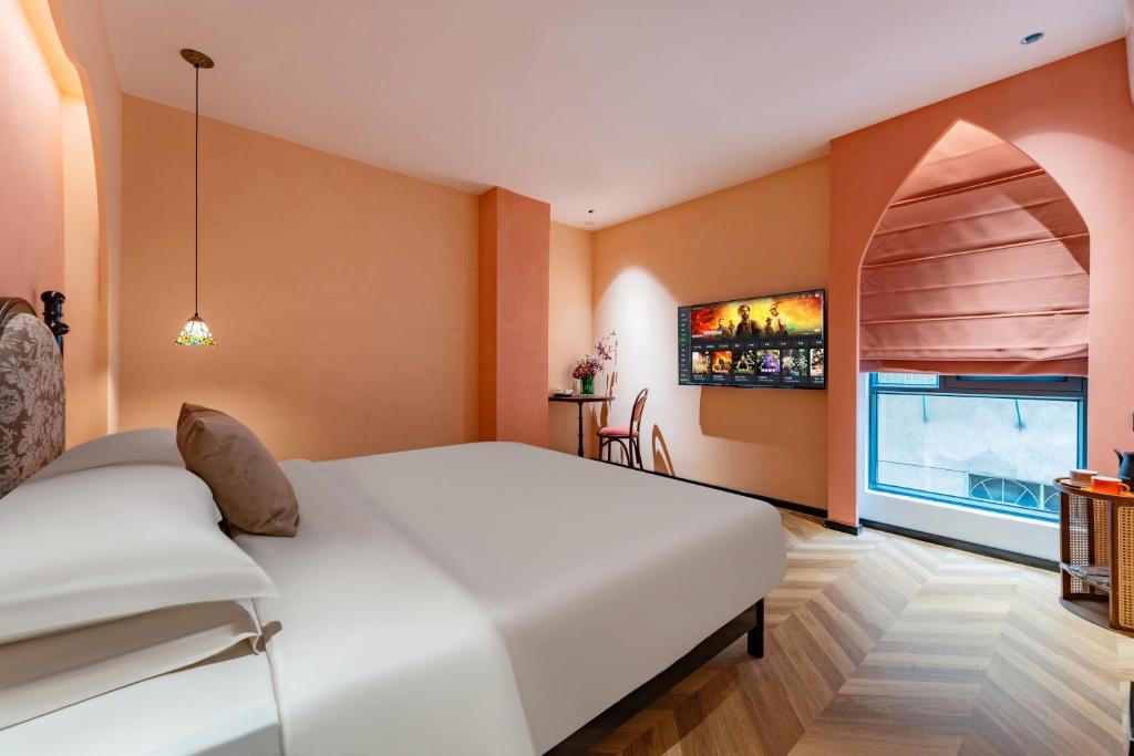 Postel nebo postele na pokoji v ubytování Chaozhou Fanhuali B&B
