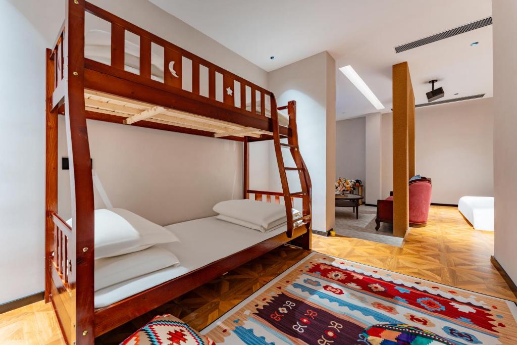 Postel nebo postele na pokoji v ubytování Chaozhou Fanhuali B&B