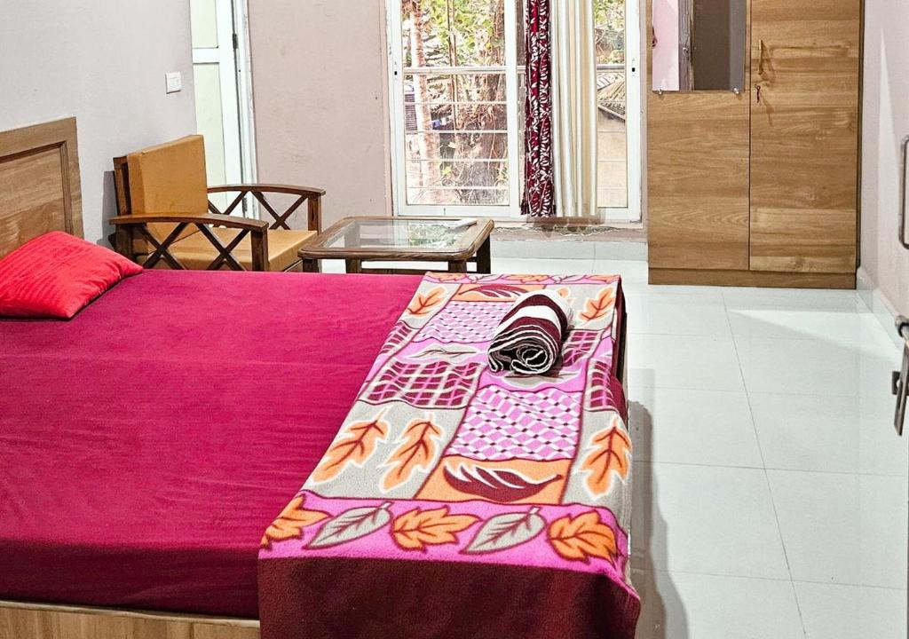 Postel nebo postele na pokoji v ubytování AYM Yoga Resort Arambol GOA