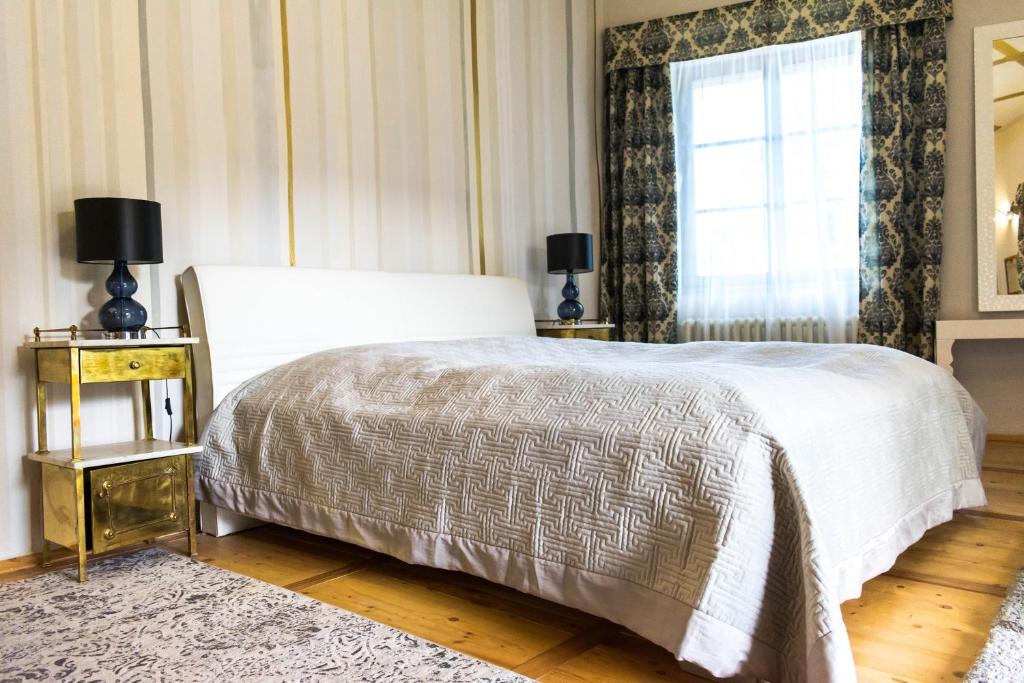 Postel nebo postele na pokoji v ubytování Chateau GrandCastle