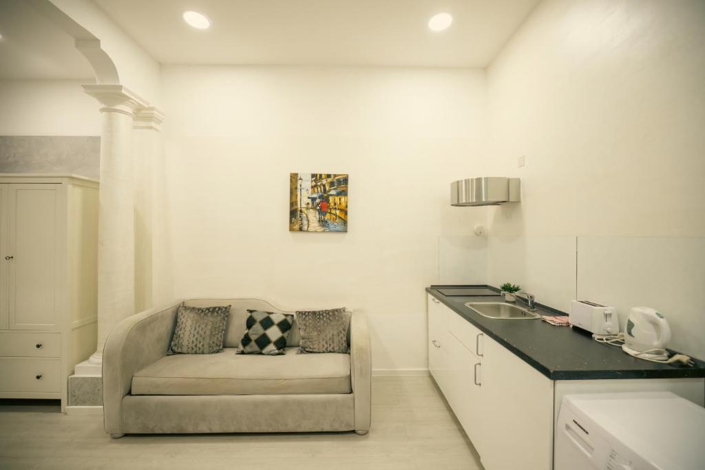 Kuchyň nebo kuchyňský kout v ubytování Sliema Central Iprime Suites