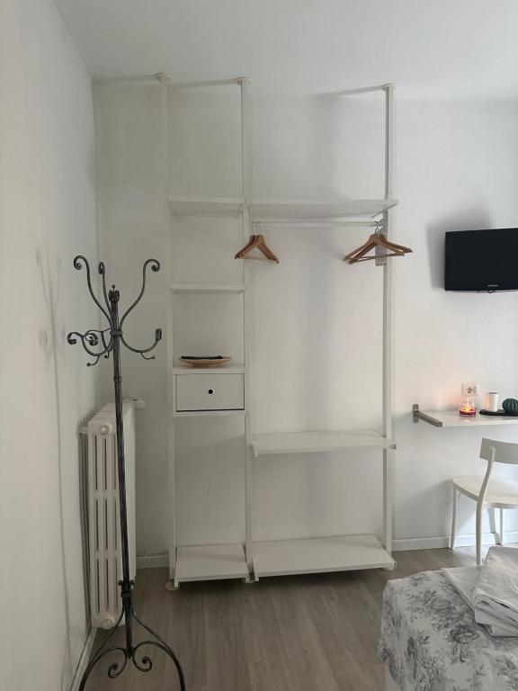 Postel nebo postele na pokoji v ubytování Albergo del Pozzo