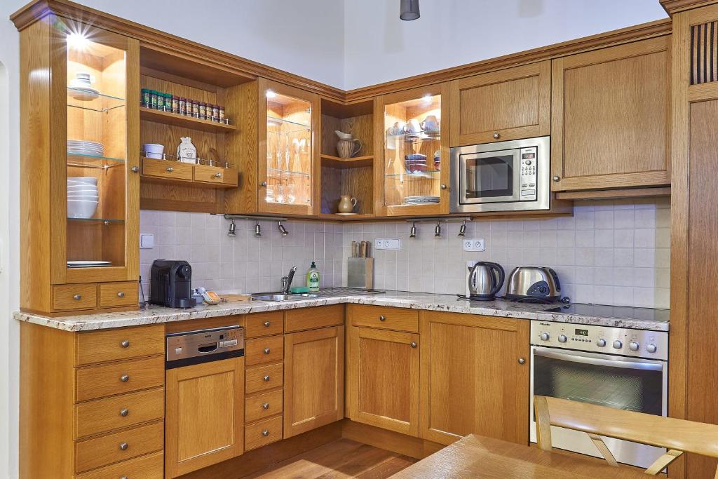 Kuchyň nebo kuchyňský kout v ubytování Hotel U 3 Pstrosu