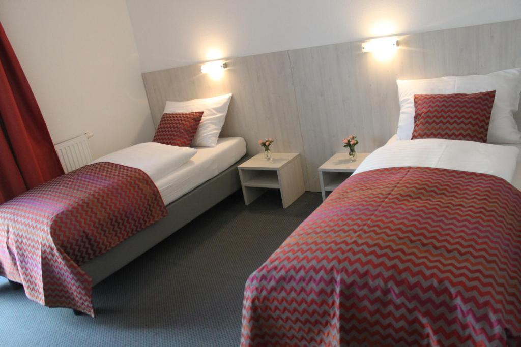 Postel nebo postele na pokoji v ubytování Best sleep Hotel