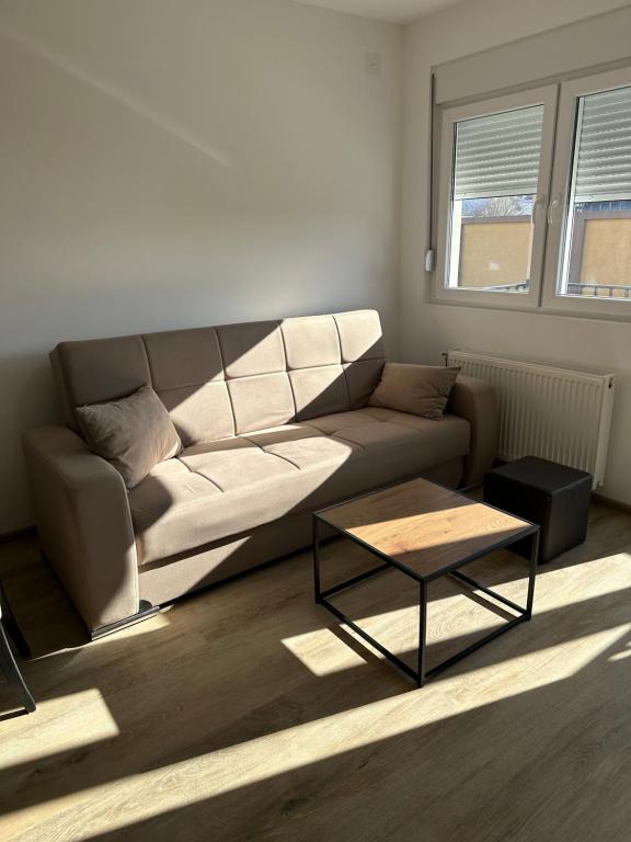 Posezení v ubytování MM-2 Apartman