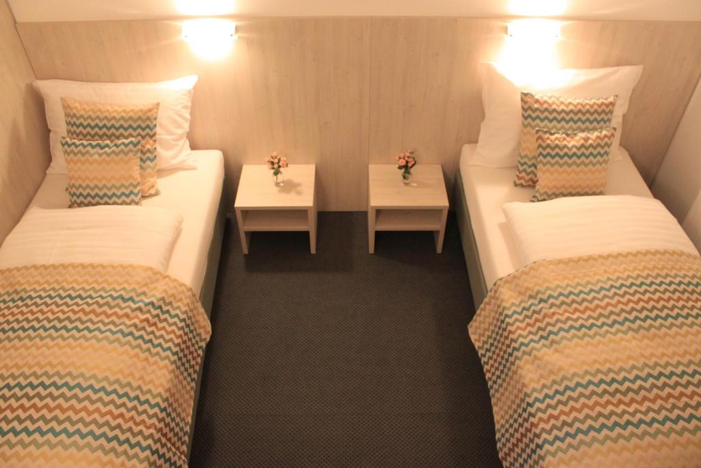 Postel nebo postele na pokoji v ubytování Best sleep Hotel