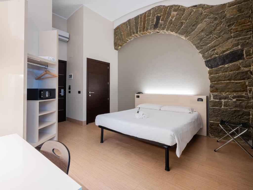 Postel nebo postele na pokoji v ubytování B&B Hotel Trieste