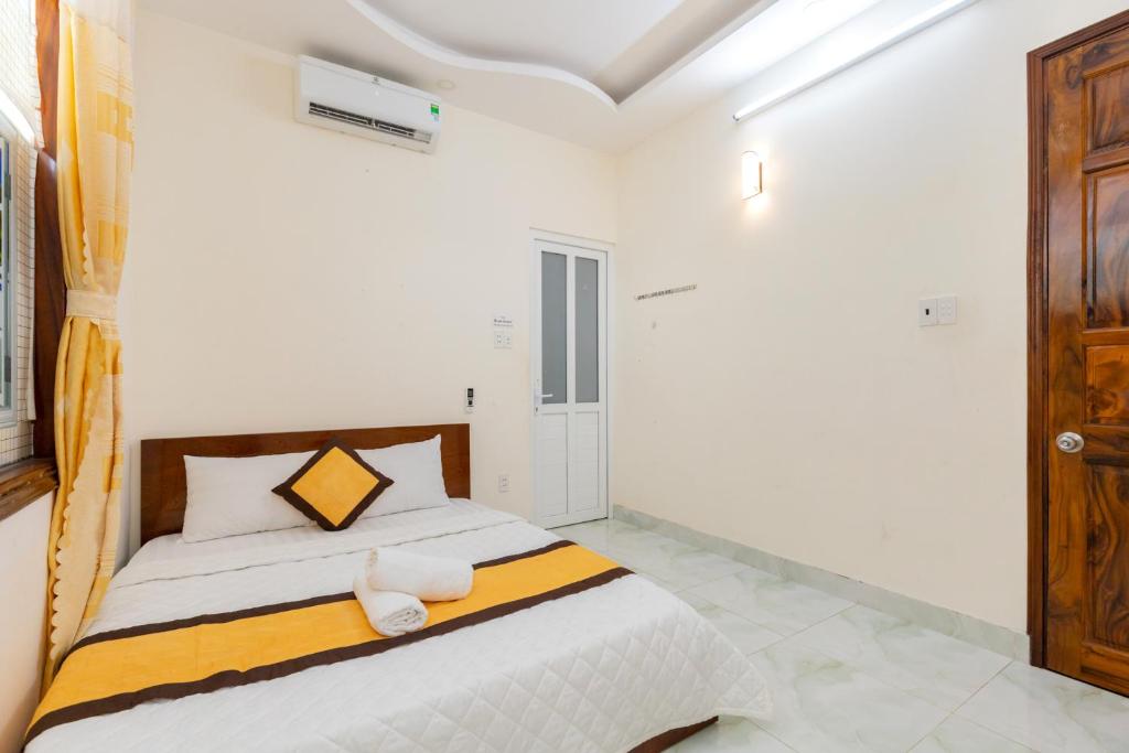 Postel nebo postele na pokoji v ubytování Homestay Bãi Sau - 5 phòng ngủ - 30 Võ Thị Sáu - Free karaoke