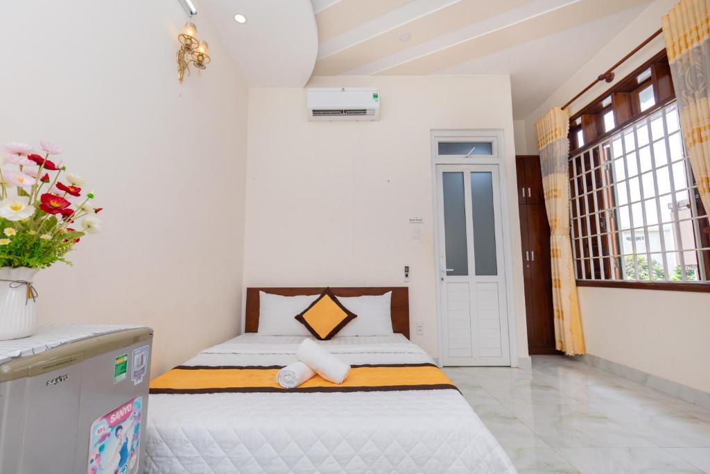 Postel nebo postele na pokoji v ubytování Homestay Bãi Sau - 5 phòng ngủ - 30 Võ Thị Sáu - Free karaoke